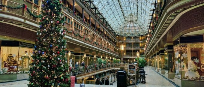 state of the art building interior with lit Christmas tree